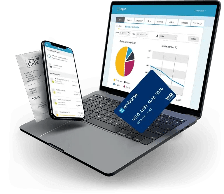 a laptop with a visa card on the keyboard