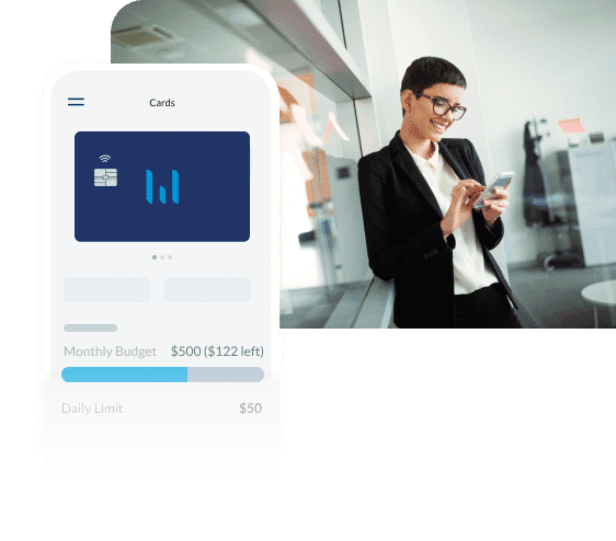 Person in office that is improving their cash flow management knowledge with Emburse solutions on mobile device
