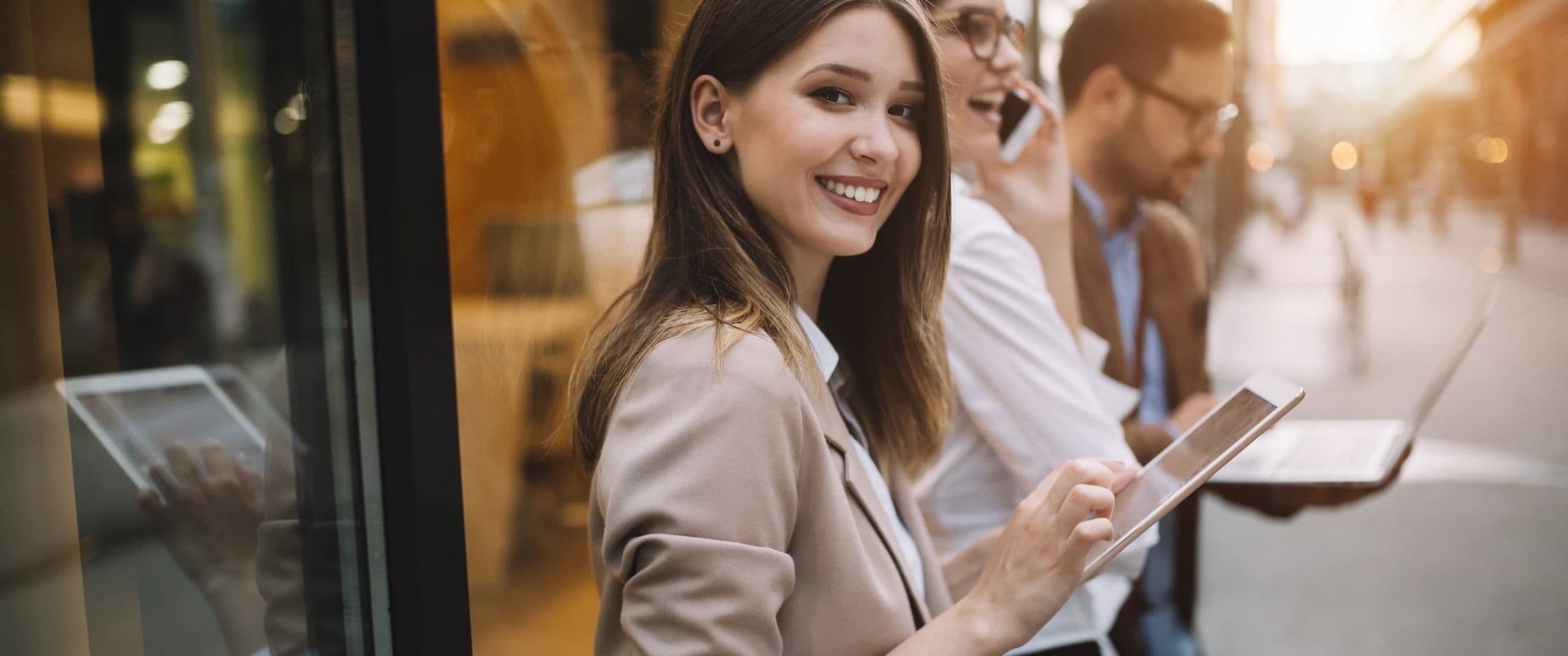 Corporate employee happy managing their bottom line with Emburse's cash flow management software