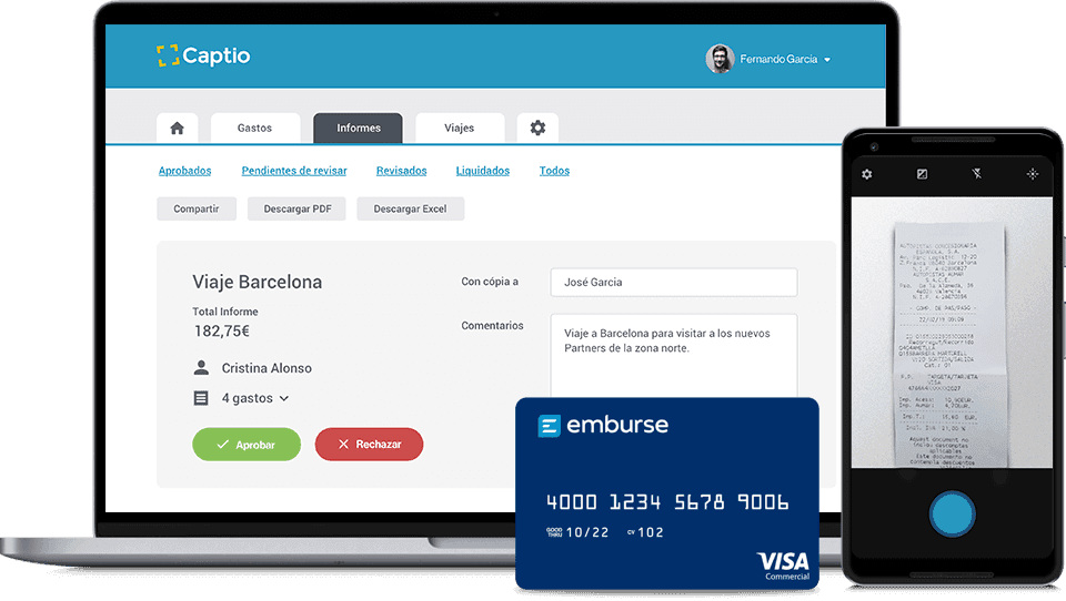 a visa card is next to a laptop and phone